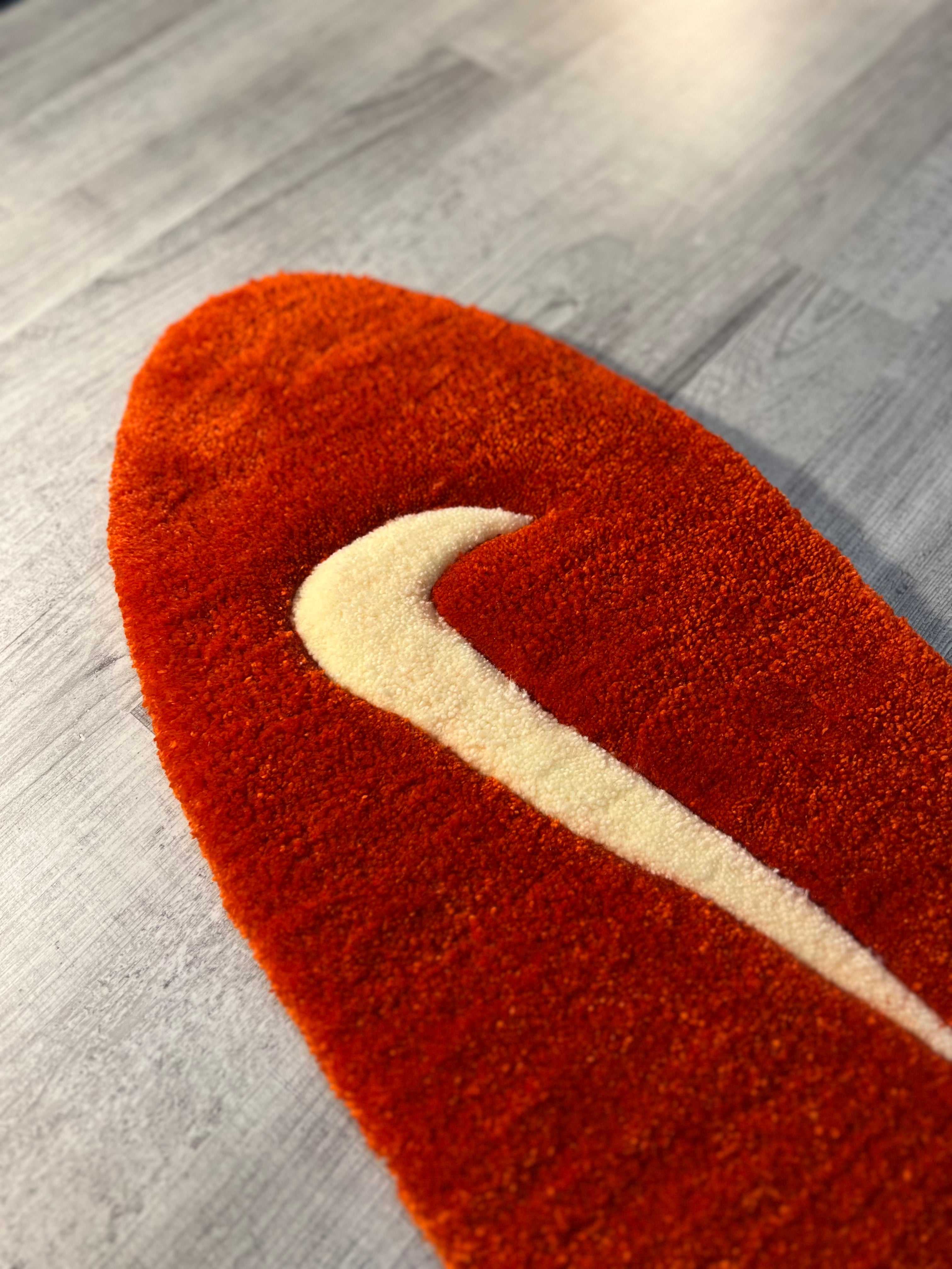 Rusty Orange Oval Rug